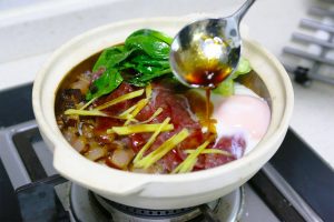 Arrange the Bok Choy on top. Pour the sauce over everything.