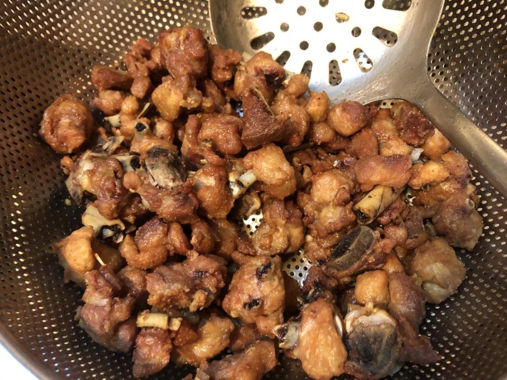 Remove the chicken and drain.