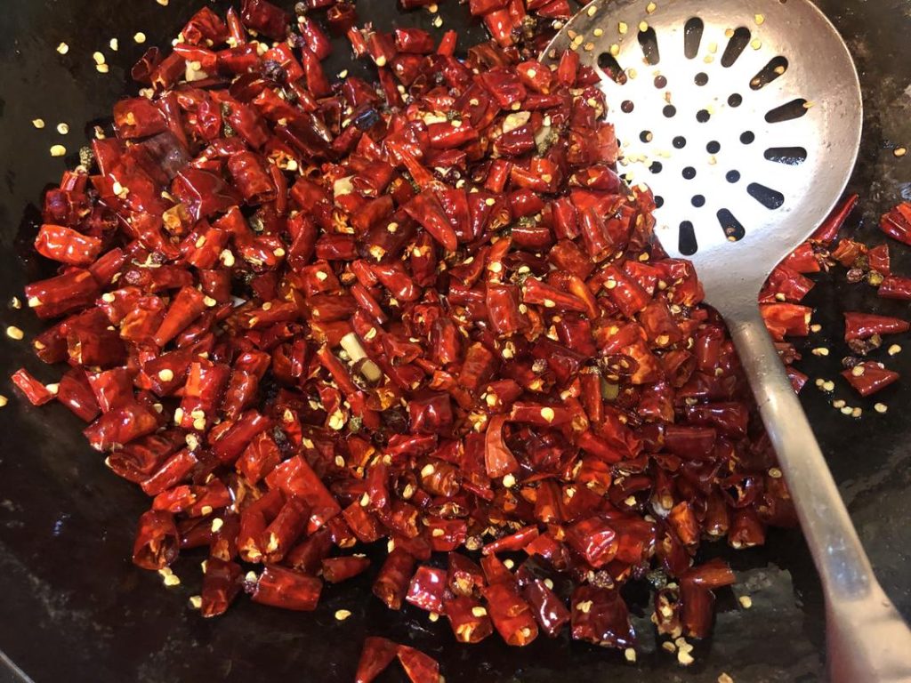 Add the dried chili sections.