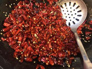 Add the dried chili sections.