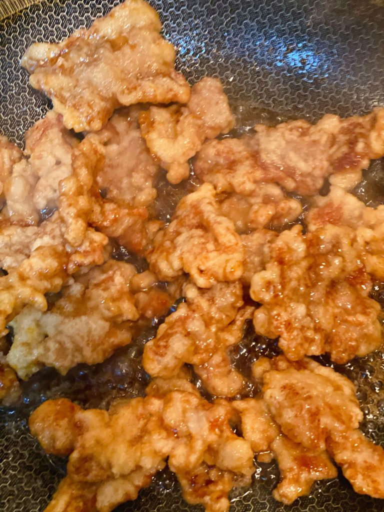 Immediately add the double-fried pork