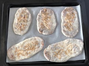 Place the pockets on the prepared baking sheet.