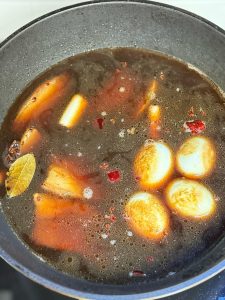 add the "tiger skin" eggs back into the pot.