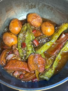 add the cooked green peppers back in.