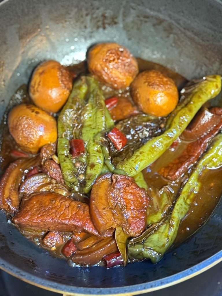 add the cooked green peppers back in.