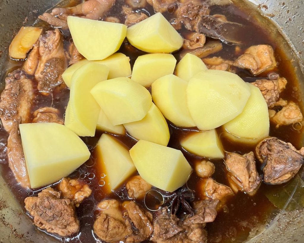 add the cut potatoes.