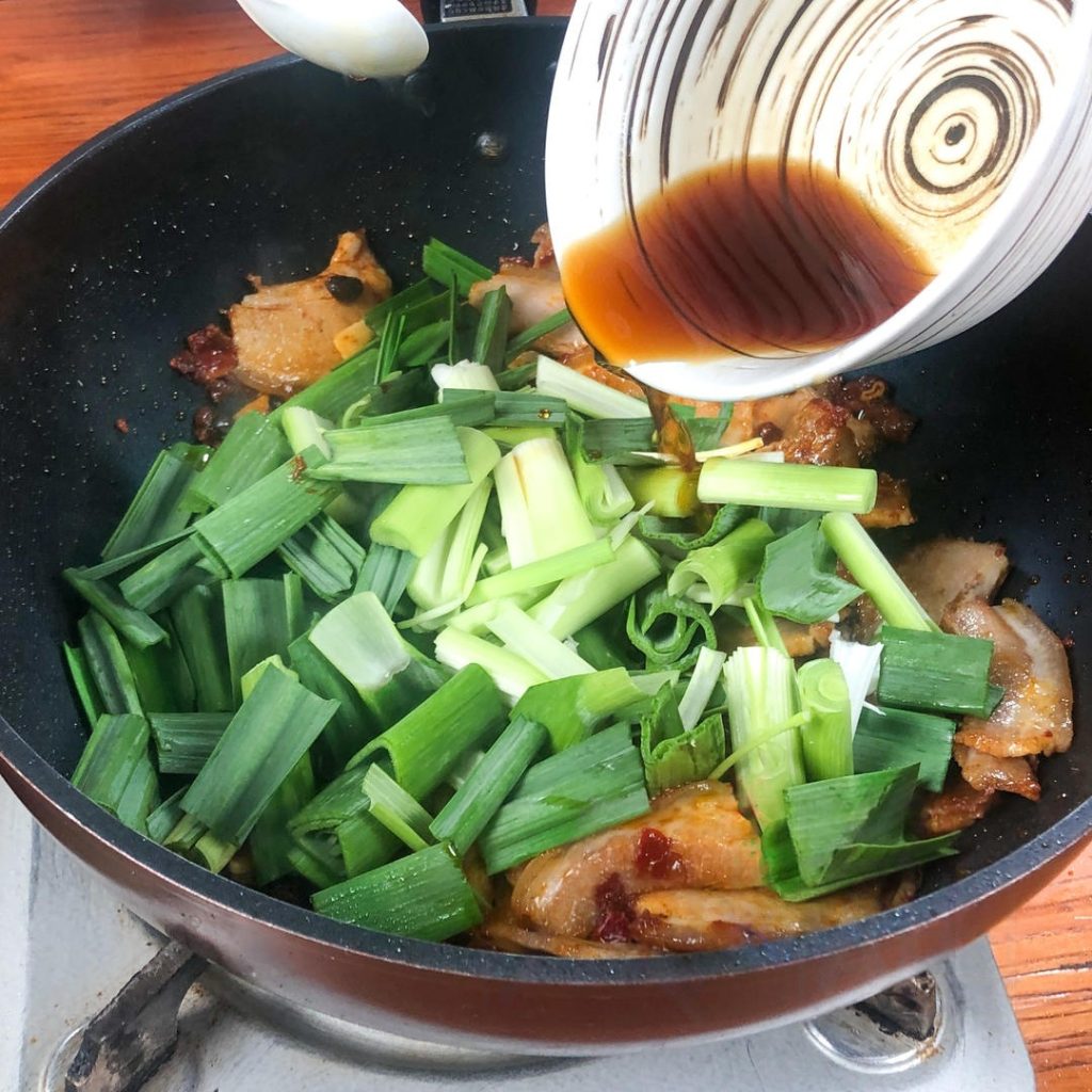 Add the green garlic stems