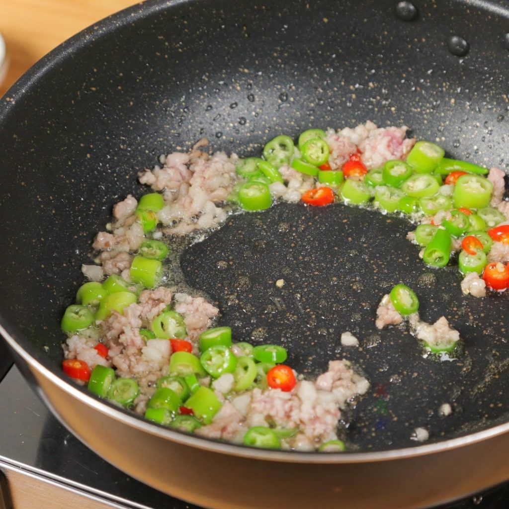 Sear the Pork And Aromatics & Chilis
