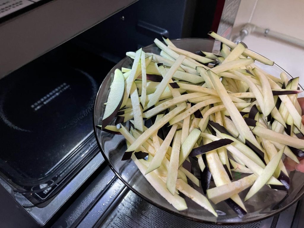 Spread your eggplant strips on a large, microwave-safe plate. Microwave on High for 3 minutes.