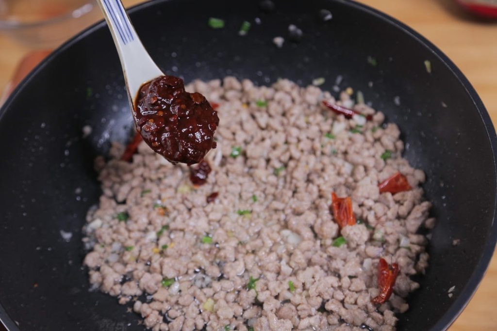 Add 1 tablespoon of Doubanjiang.