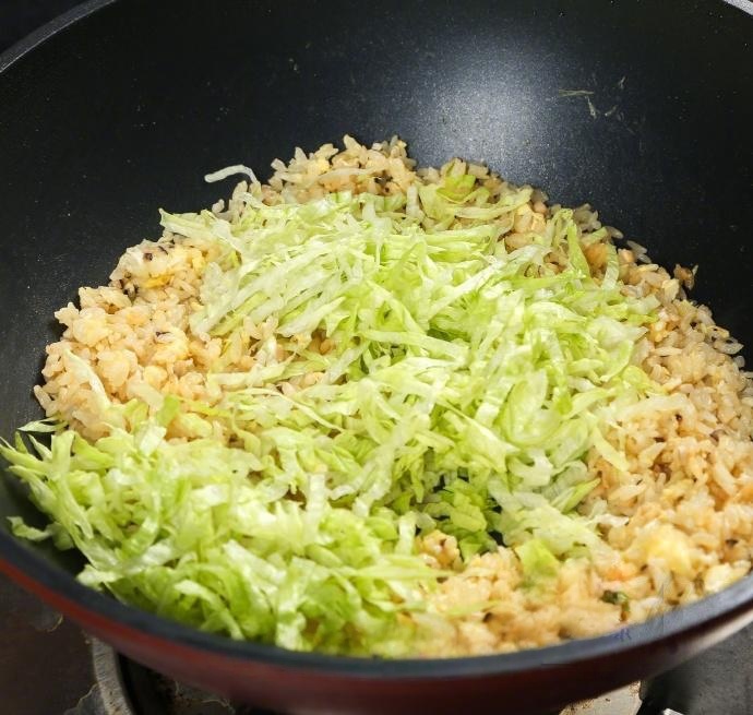 Finally, add the shredded lettuce and the chopped scallions.