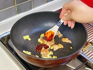 add the tablespoon of Doubanjiang and the Shaoxing Wine.
