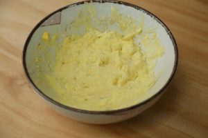 Add 3 tablespoons of mayonnaise and 1/3 teaspoon of black pepper.