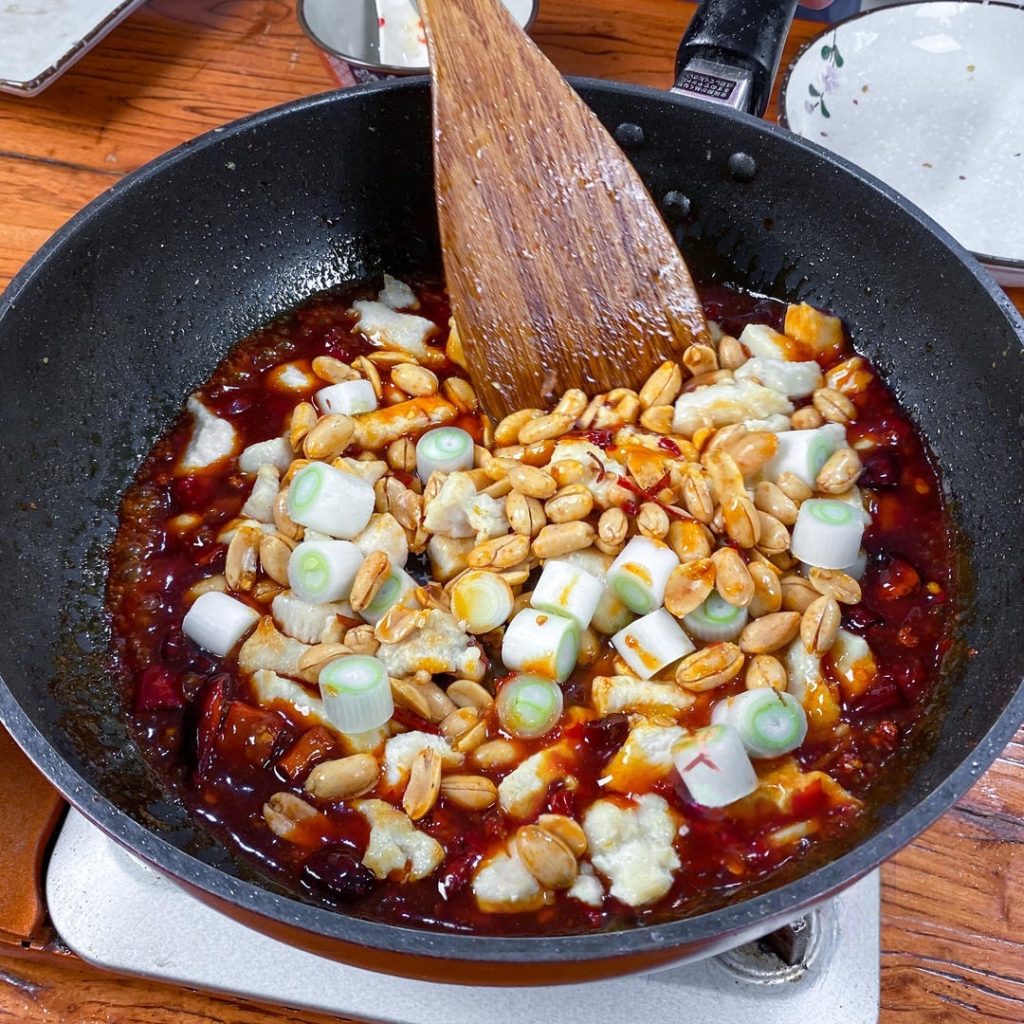 Once the sauce is thickened, toss the cooked chicken back in. Stir well to coat every piece.