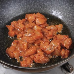 Sear the Chicken Heat your wok or large skillet over medium-high heat