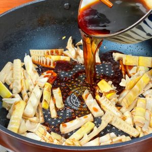 Braise Pour the pre-mixed sauce into the pan. Stir to coat everything.