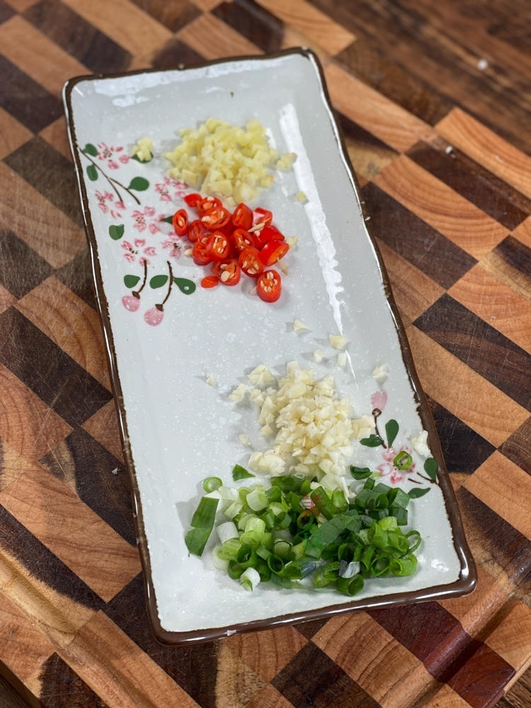 Finely chop the scallions and garlic