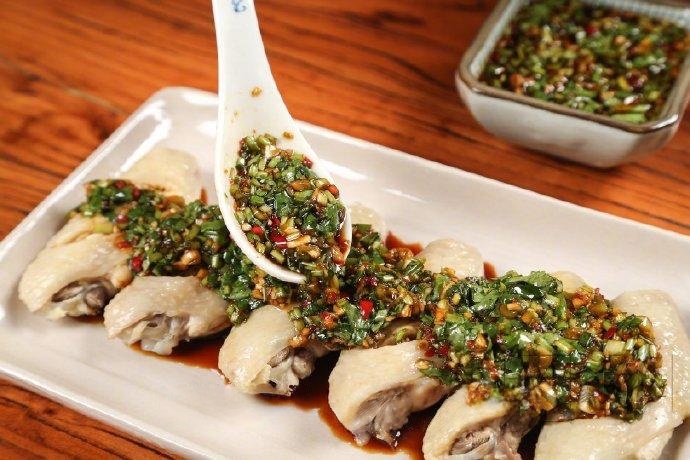 Dip the wings generously into the sauce and enjoy!