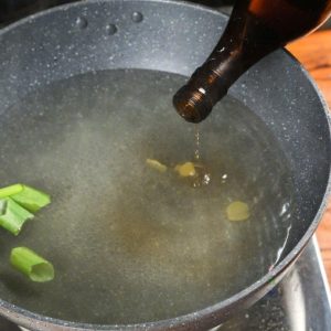 Fill a pot with enough water to submerge the wings. Bring the water to a boil over high heat.