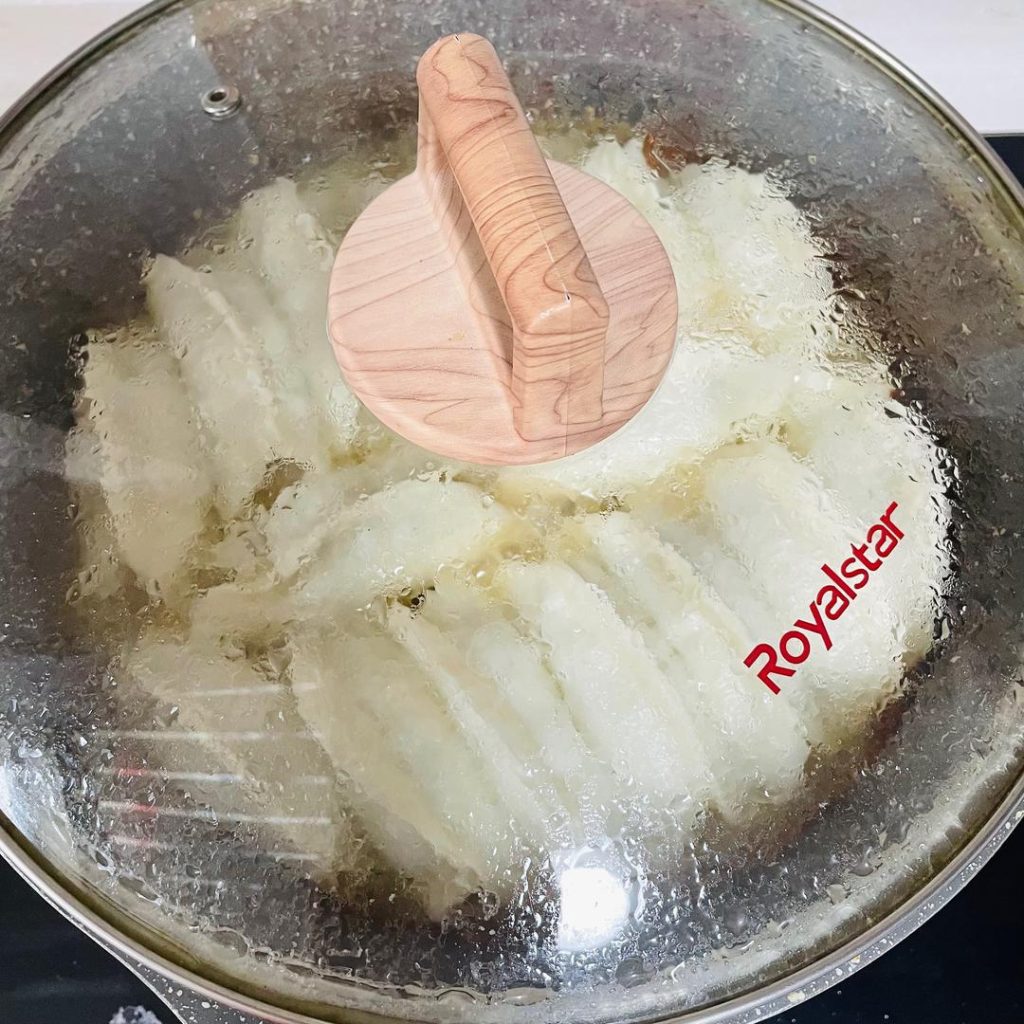 Give your slurry a quick whisk (starch settles) and pour it into the pan