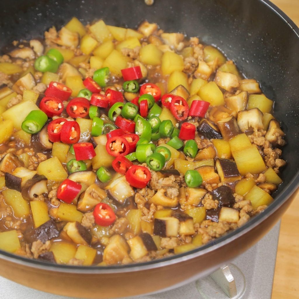 Toss in the diced mushrooms and potatoes