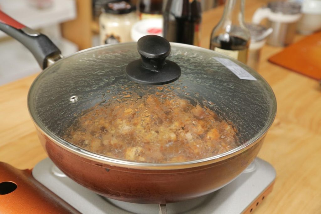 Cover the pot with a lid. Reduce the heat to medium-low and simmer for 12 minutes.