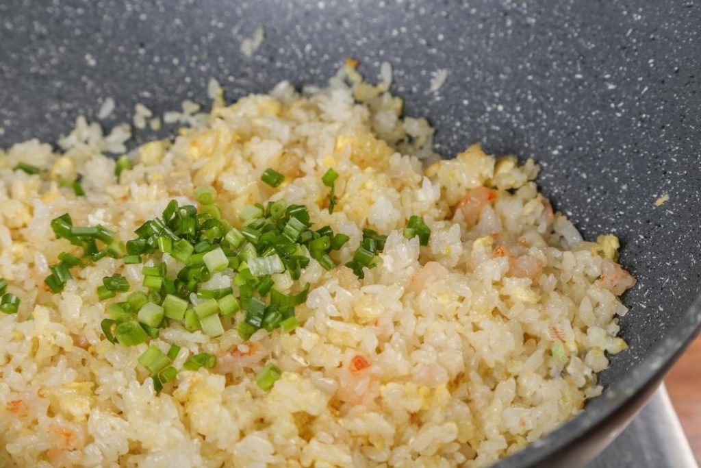 Turn off the heat. Add the chopped scallions and give it one final toss.