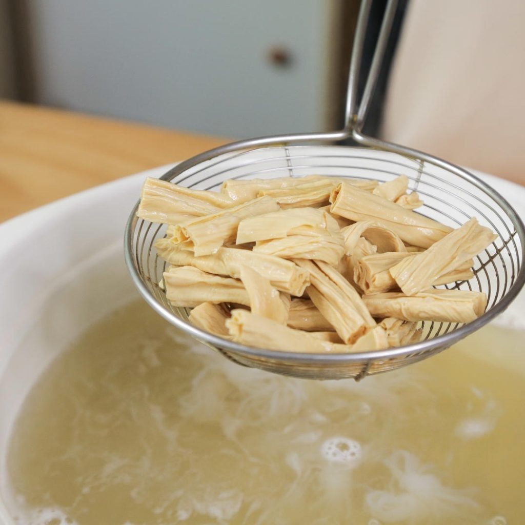 Yuba: Finally, drop the yuba segments in. Blanch quickly for just 10-15 seconds.