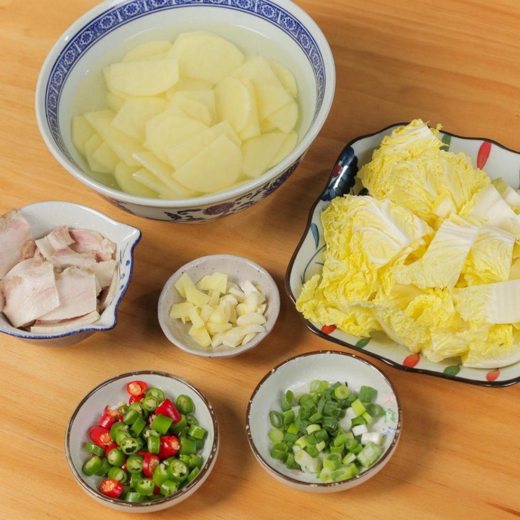 Boil the Pork And Slice the Vegetables And The Soak And Aromatics