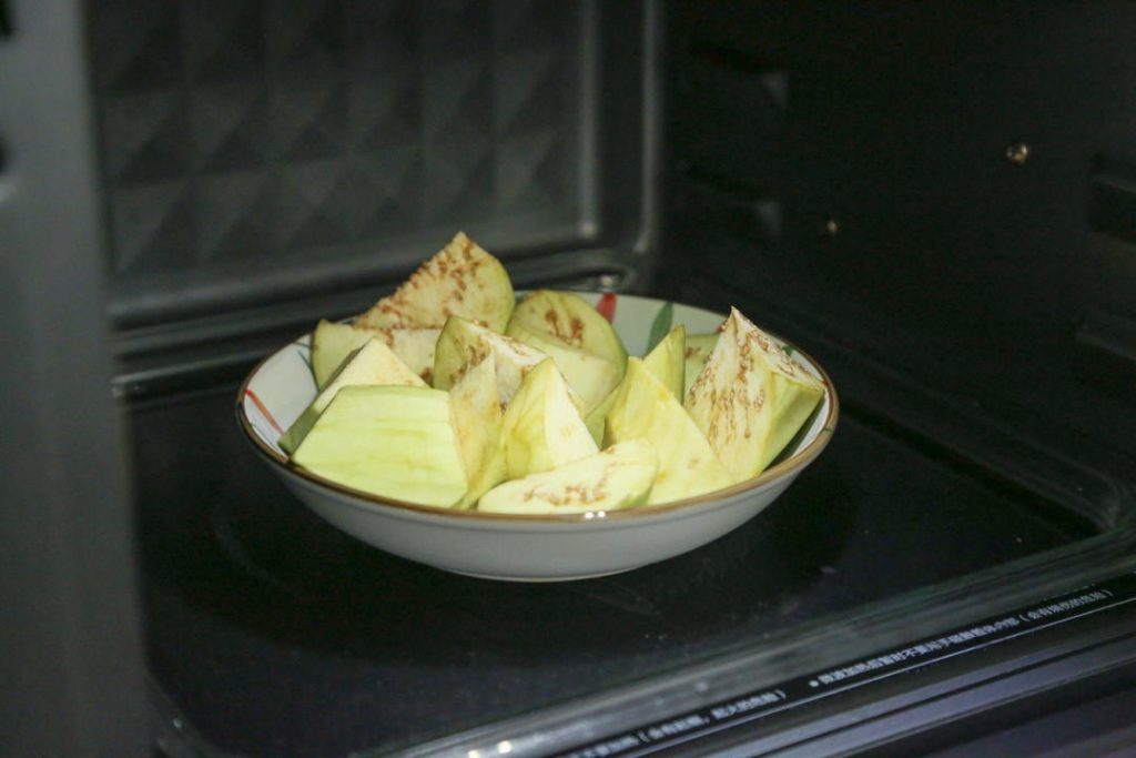 Microwave: Place the eggplant chunks in a microwave-safe bowl. Microwave on high for 3 minutes.