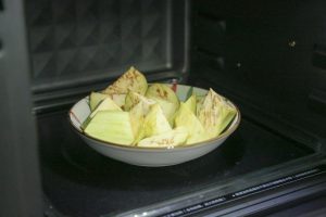 Microwave: Place the eggplant chunks in a microwave-safe bowl. Microwave on high for 3 minutes.
