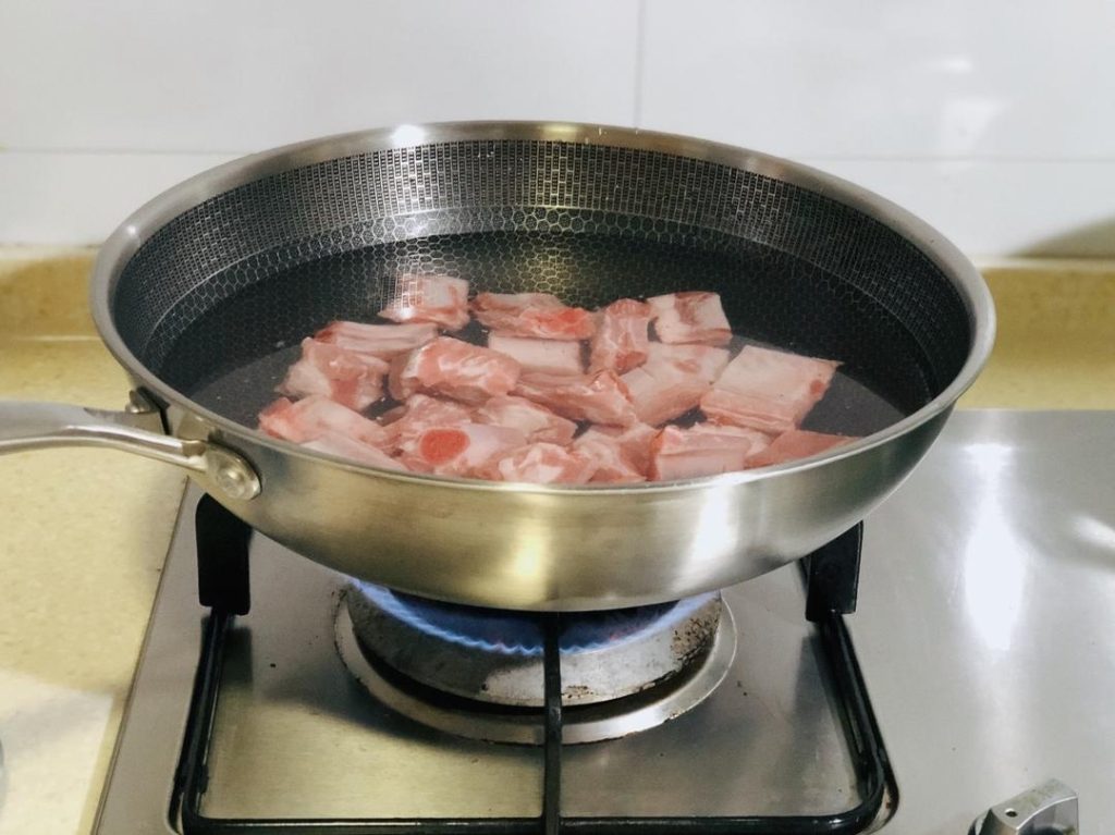 Blanch the Ribs (The "Baptism")