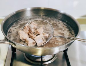 Blanch the Ribs (The "Baptism")