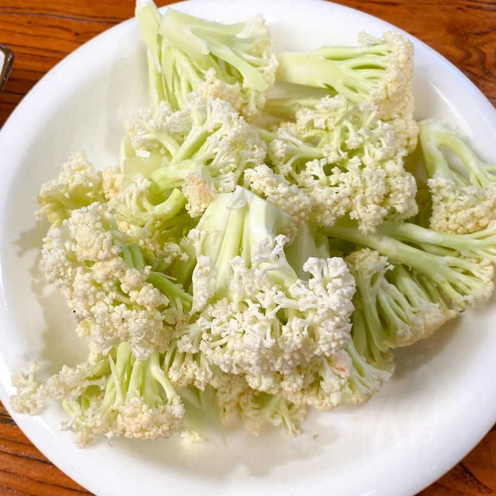Prep the Cauliflower: Wash the cauliflower thoroughly. Break it down into small bite-sized florets.