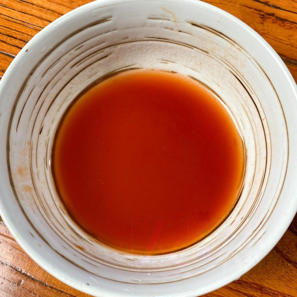 Mix the Sauce: In a small bowl, combine the 3 tablespoons water, 1/2 tablespoon sugar, 1/2 tsp salt, 1/5 tsp MSG, and 1 tbsp ketchup.