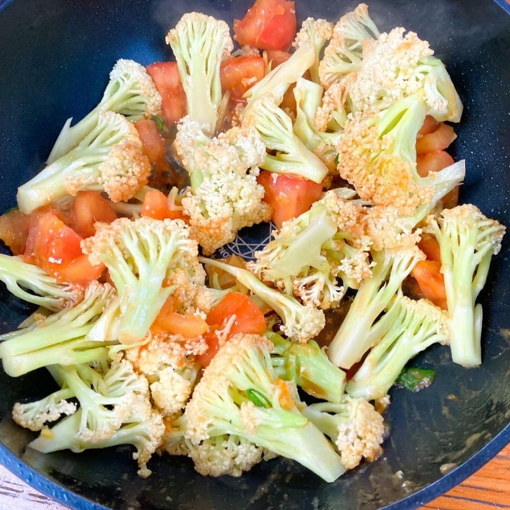Simmer with Sauce: Give your "Secret Sauce" one last stir and pour it into the pan.