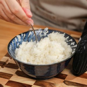 Steam both bowls in a tiered steamer over medium-high heat for 40 minutes until the rice is translucent.