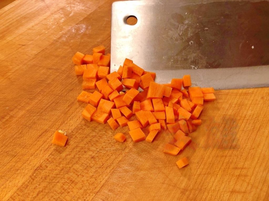 Dice 1 small potato and 1/2 carrot into small cubes (about 1cm).
