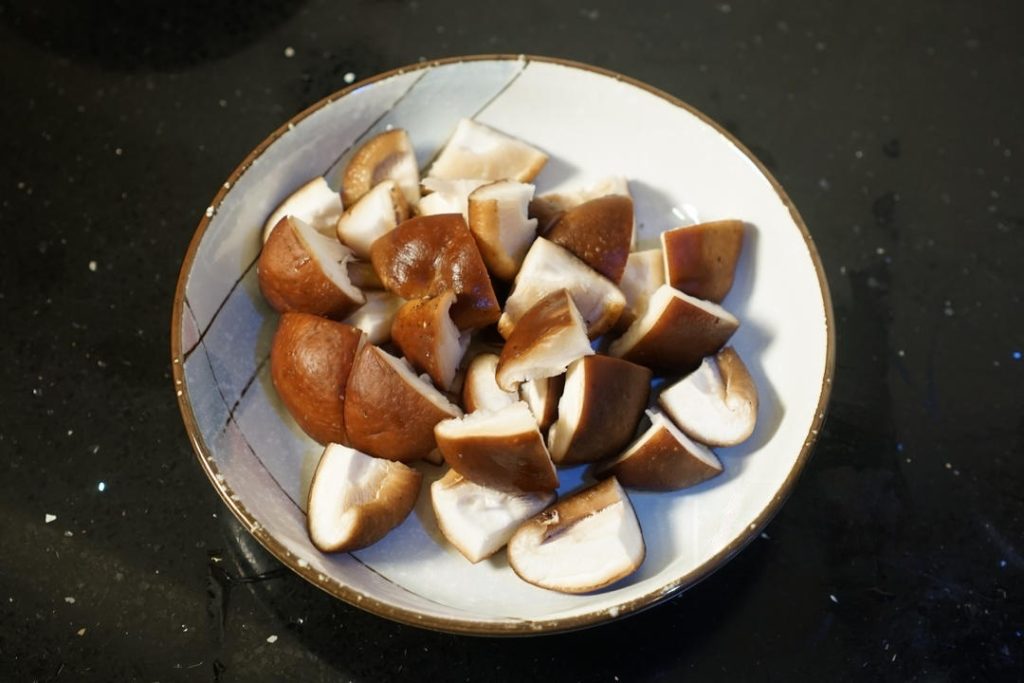 Prep the Mushrooms: Remove the stems from the 8 fresh shiitake mushrooms.