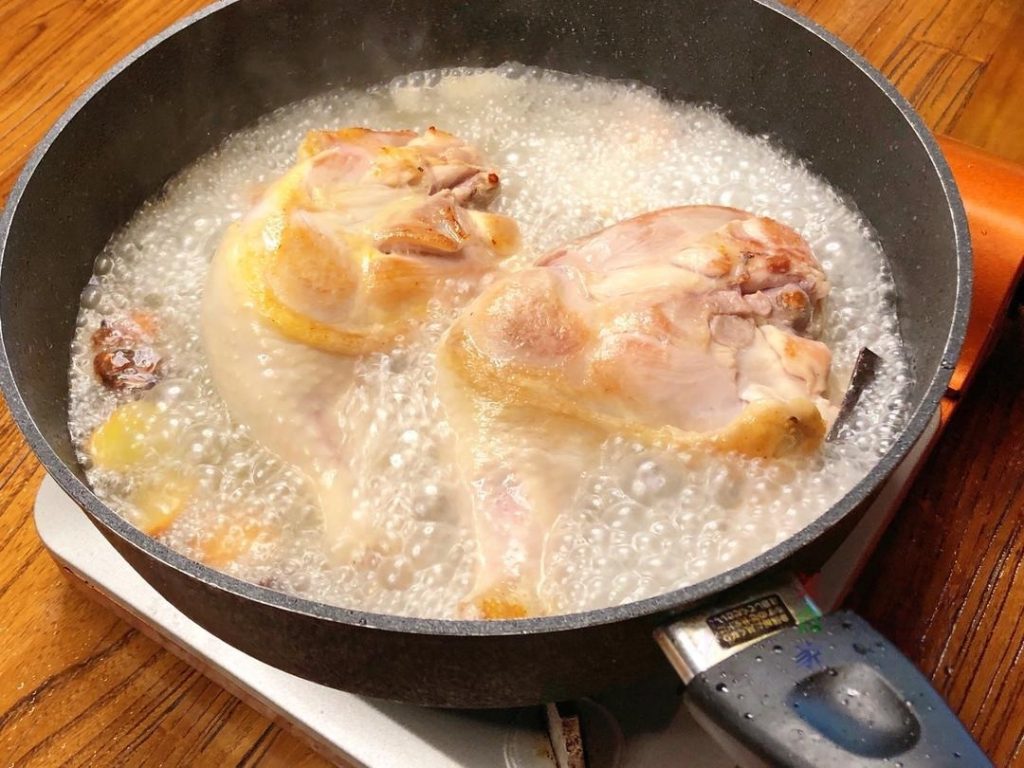 Braise Pour in water—enough to just cover the chicken legs (cold or hot water is fine here). Pour in your pre-mixed sauce. Bring the liquid to a boil.