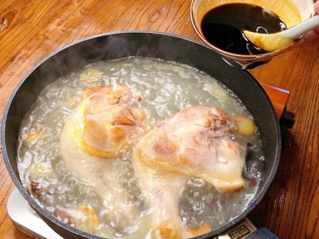 Braise Pour in water—enough to just cover the chicken legs (cold or hot water is fine here). Pour in your pre-mixed sauce. Bring the liquid to a boil.