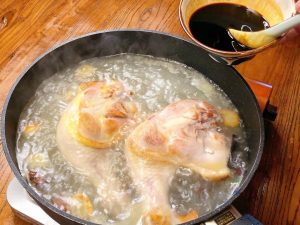 Braise Pour in water—enough to just cover the chicken legs (cold or hot water is fine here). Pour in your pre-mixed sauce. Bring the liquid to a boil.