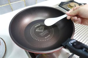 Place your wok or large skillet over medium heat.