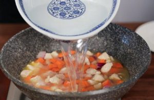 Simmer the Curry Pour in enough water to just cover the ingredients. Add the curry roux block. Bring the liquid to a boil over high heat, then immediately reduce to low heat. Cover and simmer for 30 minutes.