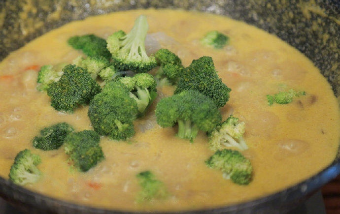 Finish with Greens and Konjac Return to your curry pot. Add the broccoli florets and the rinsed konjac knots. Simmer for another 3-5 minutes until the broccoli is tender-crisp. Taste the sauce and add salt if needed (the curry block is salty, so taste first!).