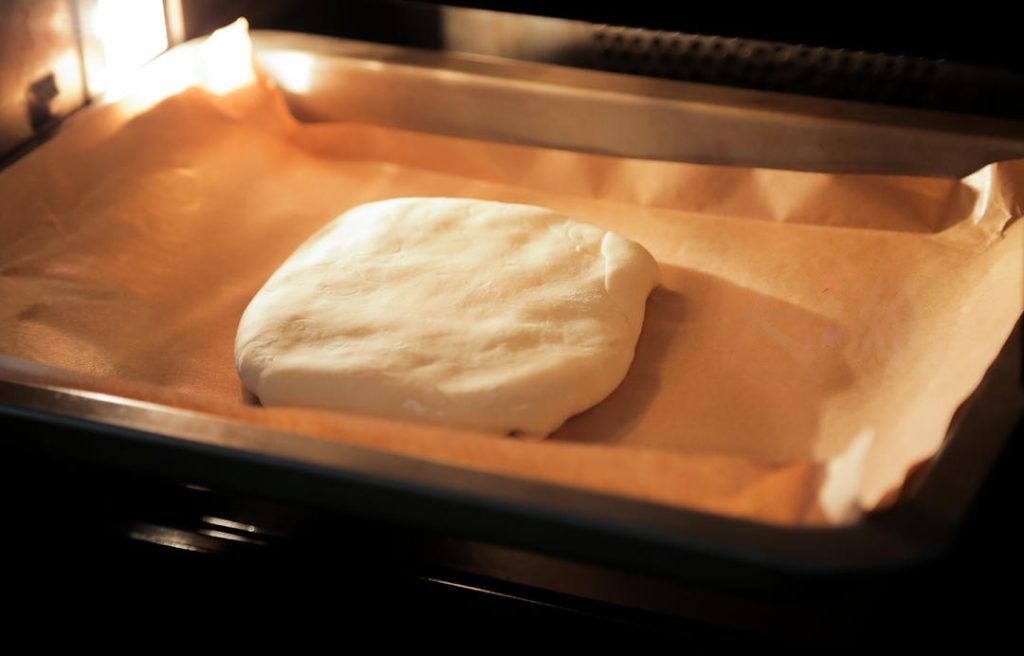 Place the pies on a parchment-lined baking sheet. Bake in the preheated oven for 10 minutes.