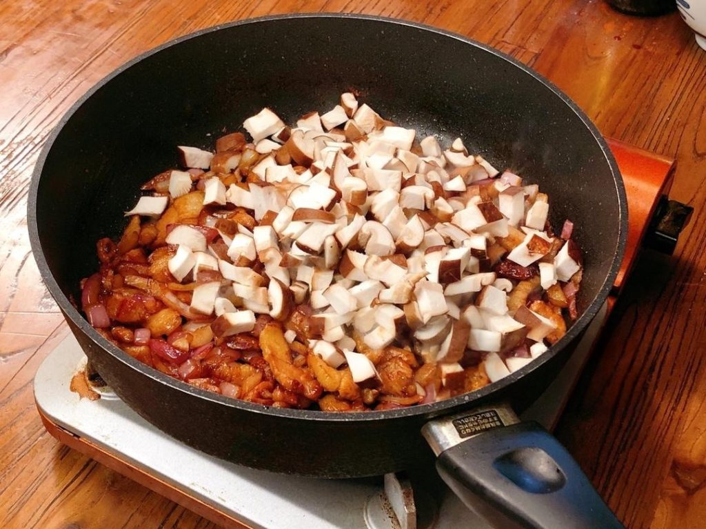 Add the mushrooms.