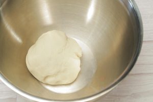 Knead: Add the vegetable oil to the dough. Knead by hand for about 10-15 minutes until the dough is smooth, elastic, and passes the "windowpane test" (you can stretch a small piece thin without it tearing).