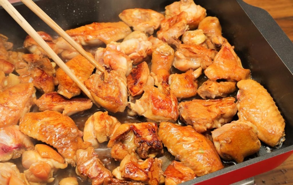 Pan-Fry the Chicken: Heat your wok or heavy pot over medium heat. Add oil. When the oil is shimmering (about 325°F/165°C), carefully place the marinated chicken in. Pan-fry until both sides are golden brown.