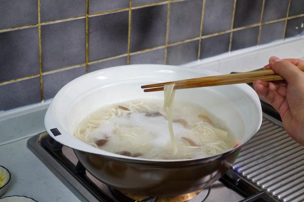 Cook the Noodles Add your noodles of choice to the boiling mushroom water.